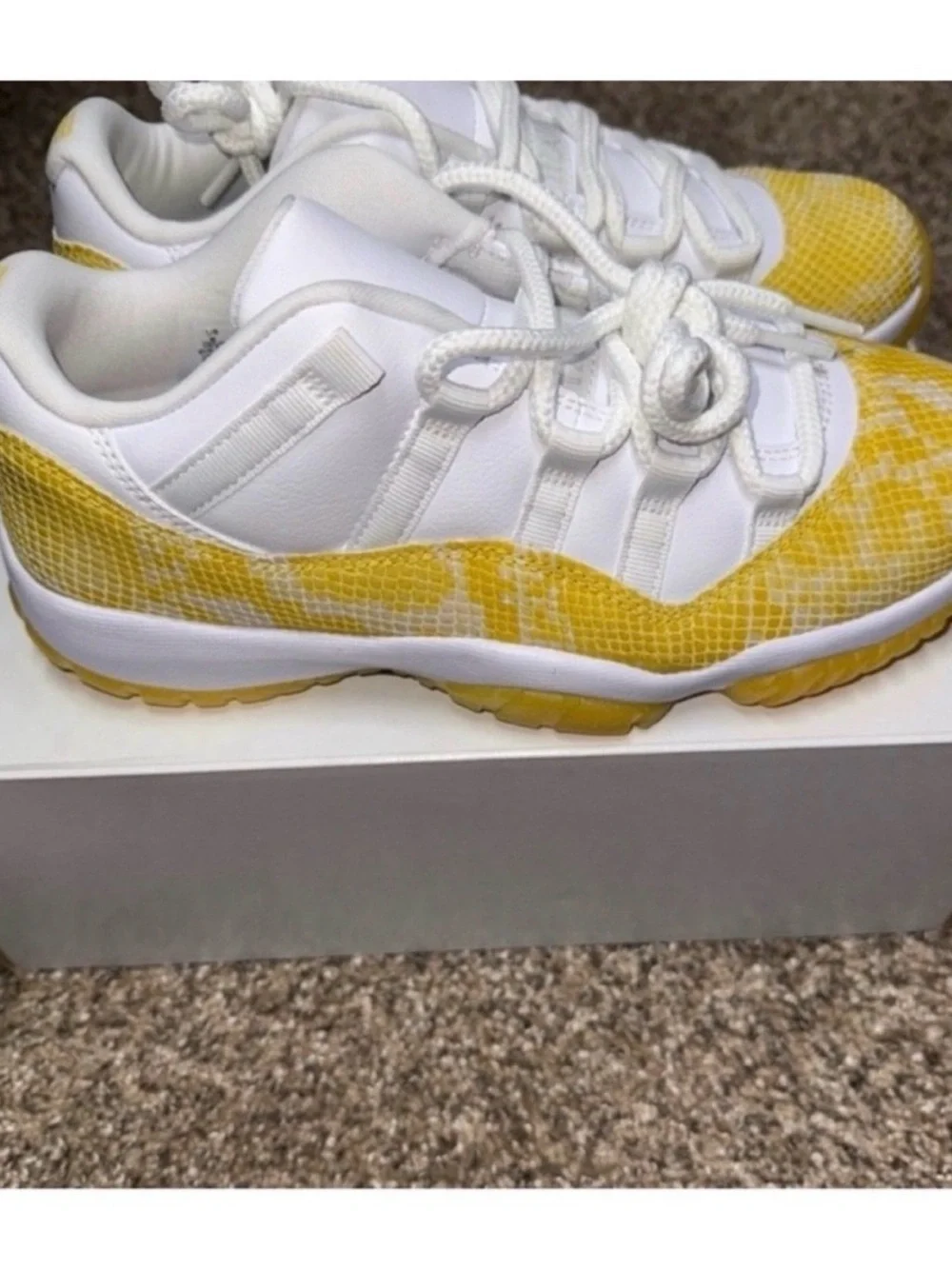 White and Yellow are Womens Snakeskin Jordan 11 Lows